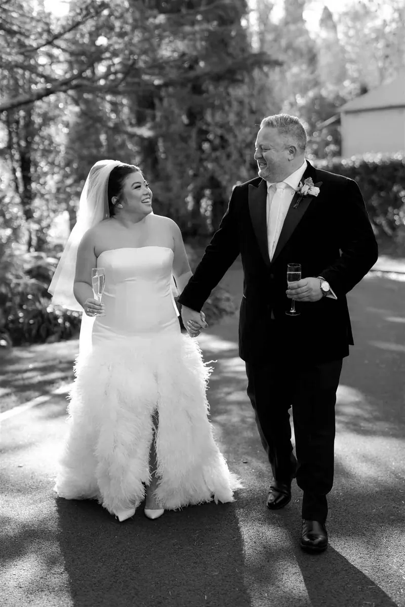 Anna, A strapless mermaid gown with an ostrich-feather skirt